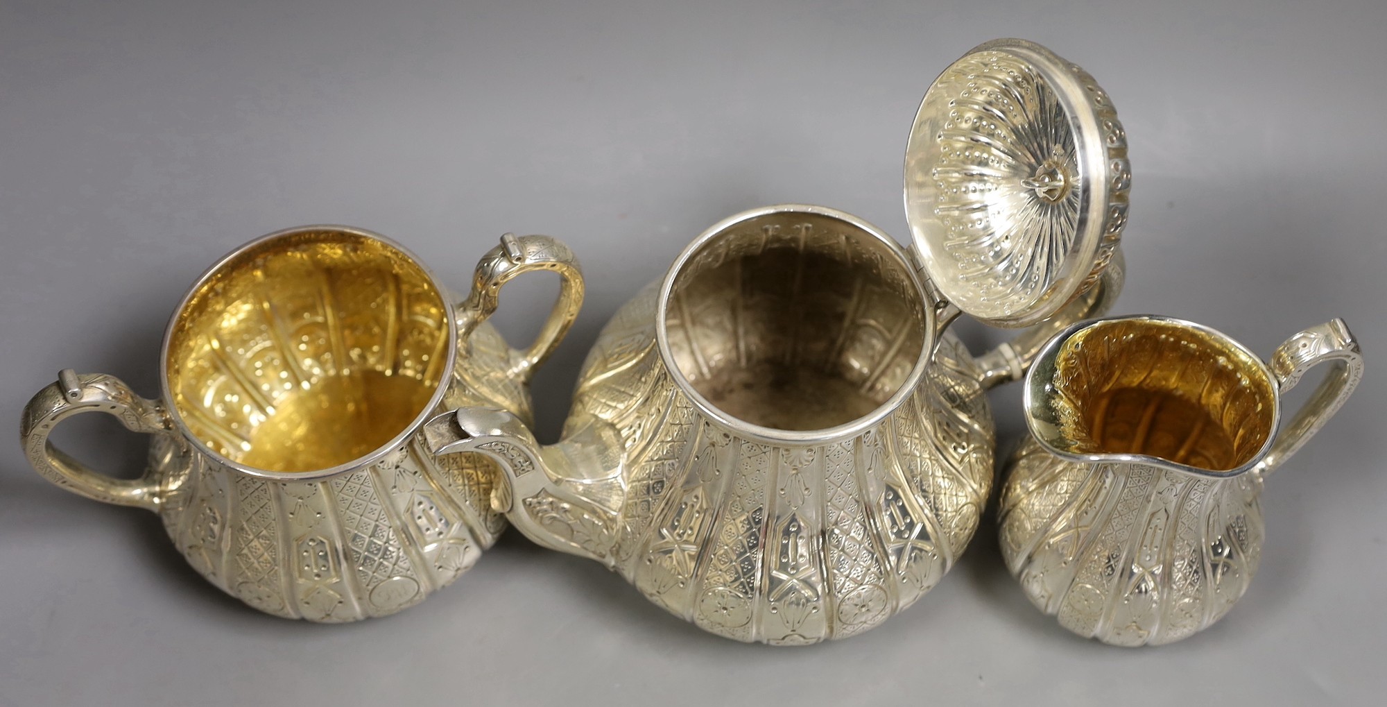 A Victorian engraved silver three piece tea set, of pear shape, by John Samuel Hunt (Hunt & Roskell late Storr & Mortimer), London, 1855/6, gross weight 45.4oz, together with original catalogue and purchase receipt, date